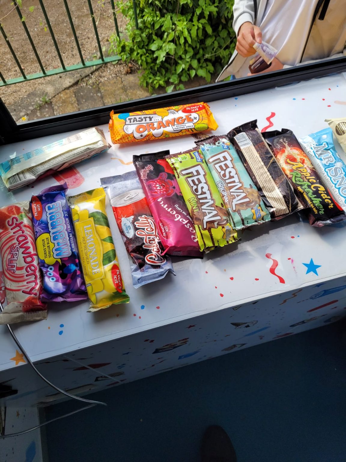 Selection of classic ice lollies and wrapped bars available from Surrey Whippys